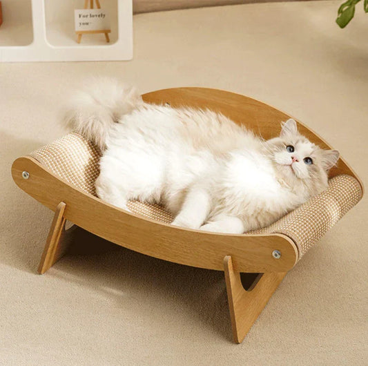 Cat resting on multi function cat scratcher