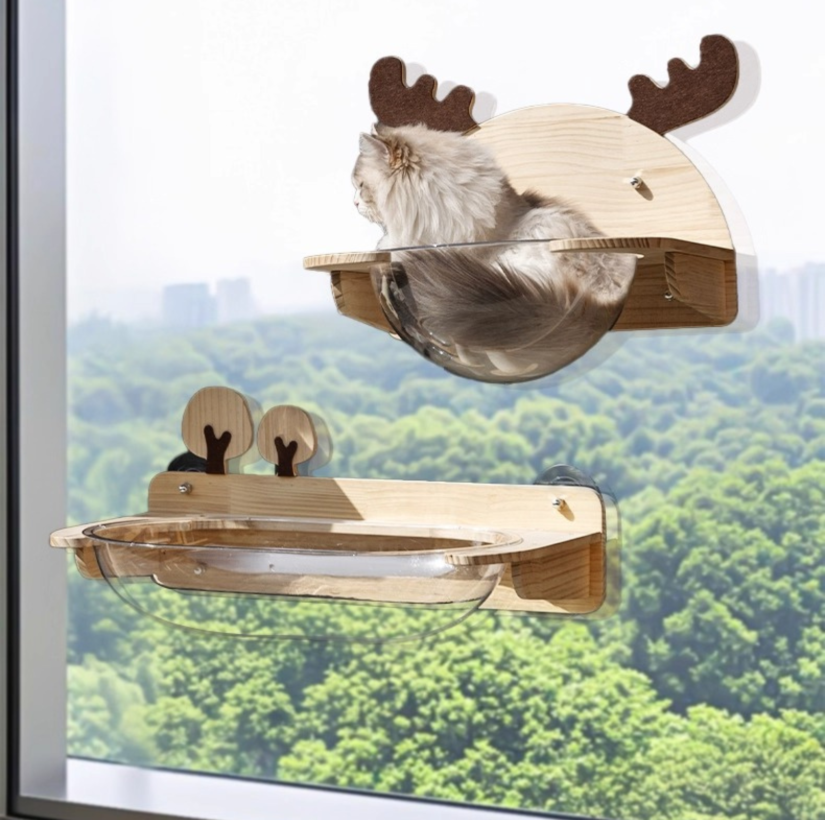 Wooden cat window perch with antlers against a cityscape background